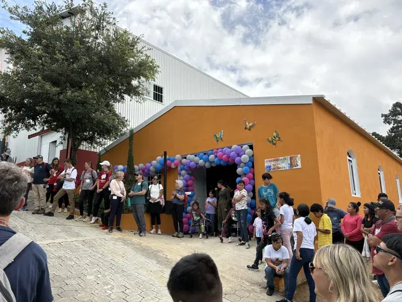 Opening day at the trade school, balloons over the door