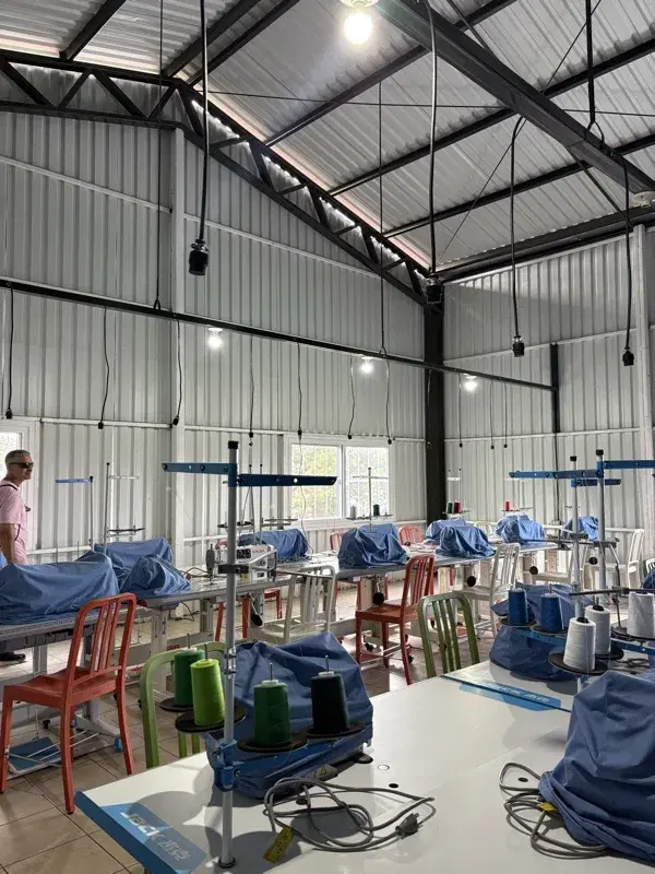 Rows of sewing machines ready for class