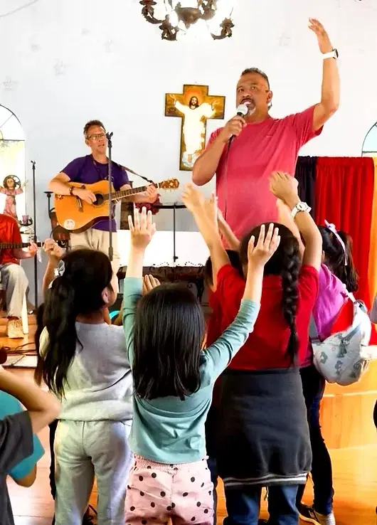Singing with the children during Vacation Bible School
